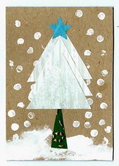 a card with a christmas tree on it and snowing around the top, as well as blue stars