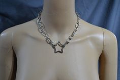 Welcome to my shop! UK Free Shipping A hand made super quality silver tone Heart or Star necklace A piece to wear with pride  Super cute grungy aesthetic jewellery, looks gorgeous with any outfit necklace lengths available in 12, 14, 16, 18, 20, and 22 inches, . If you need any custom size feel free to message us and we can work something out and adjust the price accordingly to length. heart or star pendant width approx. 3 cm   necklace chain width approx. 11 mm - a chrome plated steel chain, cl Star-shaped Metal Necklaces As Gift, Star-shaped Metal Necklace As Gift, Star-shaped Metal Necklaces For Gifts, Star-shaped Metal Necklace Gift, Silver Star-shaped Charm Necklaces For Party, Silver Star Charm Necklaces For Party, Silver Star-shaped Choker For Party, Grunge Heart-shaped Metal Necklace, Star-shaped Metal Jewelry With Adjustable Chain