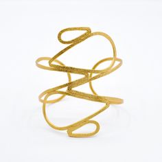 Triton Cuff - By Aris Elegant Metal Spiral Cuff Bracelet, Elegant Spiral Metal Cuff Bracelet, Elegant Spiral Cuff Bracelet As Gift, Elegant Spiral Cuff Bracelet Gift, Elegant Gold Spiral Cuff Bracelet, Elegant Spiral Bracelets For Party, Gold Contemporary Cuff Bangle Bracelet, Elegant Spiral Metal Bracelet, Elegant Spiral Metal Bangle