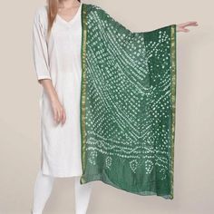 Silk Dimensions Width: 44 Inches; Length: 2.25 Metres Description Handmade Item WELCOME TO TieDyeDupatta Color :- Dark Green, Size:- Length : 2. 25 Meters Width : 44 Inches Material: Thread, Silk  ETHNICITY CHUNRI SCARVES DUPATTA  1 PCS SOLID COLOR Dupatta, Rajasthani Bandhej Dupatta tapara Silk Bandhani Bandhej Jari Border Women Heavy Dupatta Beautiful silk Indian dupatta with a hand dyed traditional chunri design. This solid tie-and-dye scarf has a very soft and light weight fabric. Lightweigh Chinon Dupatta With Bandhani Print, Wedding Bandhani Print Raw Silk Dupatta, Green Bandhani Print Dupatta For Wedding, Semi-stitched Art Silk Bandhani Print Dupatta, Green Semi-stitched Bandhani Print Dupatta, Heavy Dupatta, Rajasthani Art, Tie And Dye, Lightweight Scarf