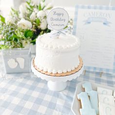 a white cake sitting on top of a table