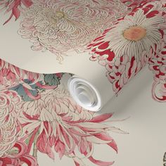 an artistic floral wallpaper with pink and red flowers on it's side,