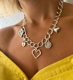 A Handmade Love Necklace that is made with chains from Stainless Steel and heart charms as pendants that create a really special result. The necklace opens and closes with its bar, so it allows it to be adjustable until 49 cm. Find it only at Christina Christi Store. My Women Necklaces Collection: https://etsy.me/2G3pmJD MATERIALS - Stainless Steel Chain - Hearts and charms are made from metal. DIMENSIONS - Love Necklace, has length 46 cm (18.1'')  - If you would like to have more or less cm to Valentine's Day Silver Charm Necklace With Chain, Valentine's Day Silver Charm Necklace, Handmade Metal Heart Charm Necklaces, Handmade Heart-shaped Metal Charm Necklaces, Cute Heart-shaped Metal Jewelry, Silver Heart Necklace With Chain For Mother's Day, Mother's Day Silver Heart Necklace With Chain, Mother's Day Silver Heart Necklace, Metal Heart Necklace With Charms