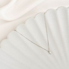 Featuring a marquise diamond drop on a dainty chain, the Aletta Necklace is an elegant and understated piece for any occasion. Crafted in 14k white gold. 


Lab grown diamond size: 2.2mm x 4.2mm

0.08 total carat weight 

Necklace can be worn at 16”, 17”, and 18” Timeless Silver Marquise Diamond Necklace, White Gold Solitaire Necklace With Briolette Diamond Cut, White Diamond Necklace With Delicate Chain, Minimalist Style, Minimalist White Diamond Necklace With Delicate Chain, Delicate Sterling Silver Necklace With Single Diamond, Minimalist Silver Diamond Necklace With Single Diamond, Minimalist White Gold Diamond Necklace For Wedding, Dainty Teardrop Diamond Necklace For Anniversary, Minimalist Teardrop Necklace With Single Diamond