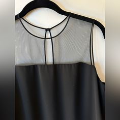 Beautiful Top That Subtly Shows Off Your Dcollet Through The Fine Mesh. It’s A Roomy Size S. Never Worn, Excellent Condition. Limited Edition, Rare Find! Sheer Tank Top For Evening Wear, Elegant Sleeveless Sheer Blouse, Elegant Sheer Sleeveless Camisole, Elegant Sheer Tank Top For Night Out, Elegant Black Tank Top For Formal Occasions, Elegant Sheer Cami Top, Black Sheer Tank Top For Evening, Elegant Sleeveless Mesh Top For Evening, Elegant Black Camisole Blouse