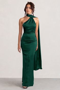 Make the most of every occasion in our beautiful Mademoiselle maxi dress. With a feminine asymmetric scarf neck that elegantly falls down the super feminine cowl back detail, this dazzling bottle green satin design is pure sophistication. You will look stunning with this gorgeous design at your next VIP party, black-tie event or gala on your agenda. Add the latest trends to your wardrobe with our statement party season dresses. Features - Asymmetric scarf neck - Backless design - Cowl back detail - Premium satin fabric Sizing & Fit Model is 5’8 and wears UK size 8 / US size 4 Product Information Designed exclusively by Club L London Fully lined and with no stretch Satin fabric (100% Polyester) Length from top of shoulder to hem: 158cm SKU: CL127576 Prom Dresses Tight Fitting, Stretch Satin Fabric, Club L London, Backless Maxi Dress, Emerald Green Dresses, Floor Length Prom Dresses, Beautiful Maxi Dresses, Scarf Neck, Scarf Dress