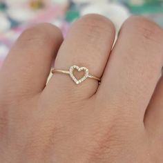 Diamond Heart Ring, 14K Solid Gold Open Heart Ring, 0.09 Ctw Natural Diamond Band, Promise Ring, Heart Shape Ring, 14k White Gold Ring - Gold KT: 14K ( 18K White, Rose , Yellow and Platinum Available upon Request) - Heart Size: 7x7mm - Shank thickness 1.2mm - Round Diamonds: 18 Stones (1mm each ) - Total Diamond Weight : 0.09 Ct - Setting Type: Micro-Pave Setting - Finish: high polish We use only CONFLICT-FREE MINED DIAMONDS. This ring can be made in any ring size, please specify, when placing y 14k Gold Heart Ring With Single Diamond, 14k Gold Heart Ring With Single Diamond For Gift, Heart Shaped Single Diamond Ring For Gift, Heart-shaped Single Diamond Ring Gift, Heart Shaped Single Diamond Gift Ring, Delicate Stackable Heart Promise Ring, Heart-shaped Single Diamond Gift Ring, Minimalist Diamond Heart Ring For Promise, Minimalist Diamond Heart Ring For Anniversary