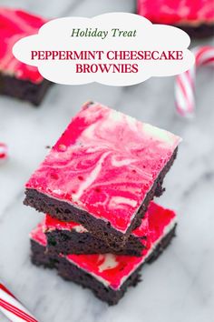 peppermint cheesecake brownies are stacked on top of each other