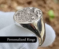 Our Etsy store specializes in creating exquisite family jewelry that is tailored to your unique heritage and history. Our Custom Crest Rings and Personalized Jewelry are crafted with the utmost attention to detail and are designed to perfectly embody your family's legacy. Our Family Heritage Bands and Heirloom Quality Bands are made with high-quality materials that ensure durability and longevity, making them a treasured family heirloom that can be passed down from generation to generation. Each Traditional Oval Engraved Anniversary Ring, Ceremonial Jewelry Ring With Engraving Option, Traditional Jewelry With Engraving Option For Anniversary, Traditional Hallmarked White Gold Signet Ring, Antique Signet Ring With Hallmarks As A Gift, Antique Jewelry With Engraving Option For Anniversary, Traditional Oval Signet Ring With Polished Finish, Handmade Classic White Gold Rings, Handmade White Gold Classic Rings