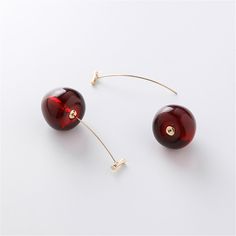 Drop whimsical charm from your lobes with this pair of earrings showcasing a juicy cherry design. 0.87'' W x 2.05'' L Snap closure 18k gold-plated copper / glass Cherry Drop Earrings, Funny Earrings, Cherry Earrings, Fruit Earrings, Essential Oil Scents, Costume Earrings, Cute Fruit, Party Jewelry, Charm Gift