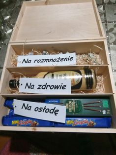 an open wooden box filled with different types of items