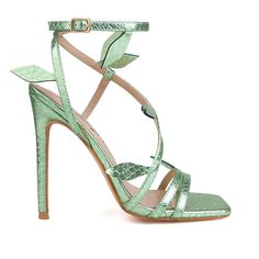 Modern 4-inch Heels For Spring, Modern High Heel Sandals For Spring, Modern Summer Heels With Flat Design, Modern Summer Heels With Flat Heel, Modern Flat Heels For Summer, Luxury Green Heels For Spring, Trendy Green Heels With Heel Strap, Modern Spring Heels, Trendy Green Heels For Formal Occasions