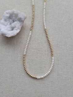 🤍 Beautiful 14k gold fill & fresh water pearl beaded necklace - 6mm 14k Gold Filled spring ring clasp (stamped 14KGF for authenticity) - 3-3.5mm - Potato shape fresh water pearls grade AA - can select your desired length White Single Strand Pearl Necklace With 14k Gold Filled, Everyday Pearl Necklace With Tiny Round Beads, Gold Single Strand Akoya Pearl Beaded Necklace, Gold Akoya Pearl Single Strand Beaded Necklace, Everyday Pearl Necklace With Tiny Beads, Everyday Pearl Drop Beaded Necklaces, Gold Akoya Pearl Beaded Necklace, Everyday White 14k Gold-filled Pearl Necklace, Everyday White 14k Gold Filled Pearl Necklace