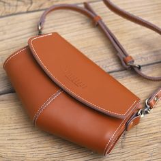 Overview: Design: Brown LEATHER Saddle Side Bags WOMEN Contrast SHOULDER BAGs Small Crossbody Purse FOR WOMENIn Stock: 3-5 days For MakingInclude: A Shoulder BagCustom: NoLeather: CowhideMeasures: L 24cm x W 9cm x H 14cmWeight: 0.13 kgSlots: 1 main slot,Accessories(option): NoneStyle: Brown LEATHER Saddle Side Bags WOMEN Contrast SHOULDER BAGs Small Crossbody Purse FOR WOMENVery durable (At least 5 Years) and it should last a life time Note: Each Item will have very slight variances to the pictu Everyday Belt Bag With Detachable Strap, Cognac Shoulder Bag With Mobile Phone Bag, Cognac Shoulder Bag With Mobile Phone Pocket, Leather Handheld Phone Bag With Adjustable Strap, Leather Lined Baguette Shoulder Bag, Leather Shoulder Baguette Bag, Brown Pouch Shoulder Bag, Everyday Crossbody Belt Bag, Handheld Saddle Bag For Everyday Use