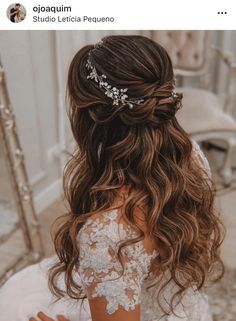 the back of a woman's head wearing a bridal hair comb