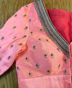 Hand embroidered ready made saree blouse / crop top/stitched saree blouse usa / onion pink saree blouse/modern blouse/zardosi blouse/elbow sleeve saree blouse/ pure silk blouse/ light pink maggam work blouse            Well..!! we understand that you may not get in your desired size/pattern, here you go with customization according to your size/pattern which we can deliver in 1-2 weeks of time period !!      Here is a beautiful Hand embroidered zardosi work crop top / blouse in peach pink color that has deep V neck with hand knot embroidered border and butis all over sleeves and necks as shown!! This is saree blouse has elbow sleeves with butis all over the body , Runs with any self or contrast color saree !! Please message us for any color / size customization !!       Fabric : pure raw s Festive Semi-stitched Pink Blouse, Pink Resham Embroidery Top With Traditional Drape, Pink Blouse With Dori Work For Diwali, Pink Art Silk Blouse Piece With Dori Work, Navratri Pink Blouse With Resham Embroidery, Pink Blouse With Resham Embroidery In Traditional Drape, Semi-stitched Anarkali Blouse In Pink, Pink Blouse With Resham Embroidery For Navratri, Pink Anarkali Blouse With Dori Work