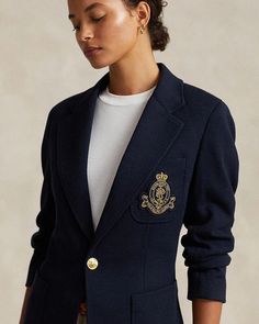 This modern blazer stands out with embellishing details while maintaining timeless style. Featuring a notched lapel, button front closure and long sleeves with buttoned cuffs, it offers versatile layering. An embroidered crest at the chest pocket along with hip and chest patch pockets add fashion-forward flair. Lined in luxurious fabrics, this piece moves effortlessly from day to night. Crafted from a soft blend, it feels as polished as it looks. With its back vent and adaptability for all occas Classic Blazer With Patch Pockets, Classic Long Sleeve Blazer With Patch Pockets, Luxury Long Sleeve Blazer With Pockets, Luxury Blazer With Patch Pockets For Work, Designer Long Sleeve Blazer With Welt Pockets, Ralph Lauren Outerwear With Lapel Collar And Welt Pockets, Ralph Lauren Outerwear With Welt Pockets And Lapel Collar, Ralph Lauren Long Sleeve Outerwear With Welt Pockets, Ralph Lauren Single-breasted Long Sleeve Blazer