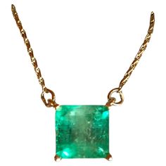 Square Cut Colombian Emerald Solitaire Pendant Drop Necklace in 14K Yellow Gold. This necklace features a medium green natural Colombian emerald, clarity: SI, Weight 1.68 Carat, Square Shaped 7.0mm x 7.0mm prong-style setting. Wheat Chain 14K Yellow Gold 16.5" total pendant necklace weight 2.55g Emeralds typically contain inclusions that are visible to the unaided eye. Because of this, trade members and some consumers understand and accept the presence of inclusions in emeralds. Eye-clean emeralds are especially valuable because they’re so rare. Emerald inclusions are often described as looking mossy or garden-like. They’re sometimes called "jardin,” which is French for garden. Formal Hallmarked Emerald Necklace, Classic Green Emerald Necklace In 14k Gold, Formal Green Emerald Necklace In 14k Gold, Green Emerald Pendant Necklace For Formal Occasions, Formal Green Emerald Pendant Necklace, Classic Green Emerald Pendant Necklace, Formal Emerald Necklace With Square Pendant, Classic Hallmarked Emerald Necklace, Formal Green 14k Gold Necklace