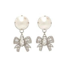 These beautiful Platinum toned earrings are a must-have for any jewelry collection. They feature chic bows adorned with oversized resin pearls and white crystals for a touch of fun and sparkle. Perfect for any occasion, these earrings will easily become your go-to piece of jewelry. They are lightweight, comfortable to wear, and will add a touch of elegance to any look. The perfect finishing touch for any outfit, these earrings will make you feel special! Pearl Embellished Earrings For Party, Chic White Crystal Earrings For Party, White Pearl Earrings With Bow For Party, Evening Pearl Jewelry With Bow Detail, White Bow Jewelry For Evening, Evening Pearl Jewelry With Bow, Glamorous Silver Earrings With Bow, Glamorous Silver Bow Earrings, Pearl Jewelry With Bow Detail