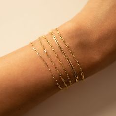 Dainty and masculine, this Gucci Marina Italian chain has an intricate link design. Perfect accessory to stack bracelets. 14K Solid Gold Italian Gucci Marina chain, width 1.5mm Length options in pull-down menu Handcrafted in NYC Hypoallergenic, lead and nickel free #BS029 Bracelet Combo, Italian Gold Jewelry, Cuban Chain Bracelet, Italian Chain, Stack Bracelets, Link Design, Italian Jewelry, Stackable Bracelets, Dainty Bracelets