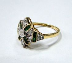 Vintage Art Deco 18 k solid gold Diamond Emerald Ring. Usa ring size-7 ( we can adjust to any size), width-14.5 cm, weight-3.200 grams, Diamond Weight -.50 carat. Material-18 K solid gold natural Emerald and Diamonds. Victorian Gold Emerald Ring For Wedding, Heirloom Gold Marquise Cut Emerald Ring, Victorian Emerald Ring For Wedding, Heirloom Marquise Cut Gold Emerald Ring, Victorian Yellow Gold Emerald Ring For Anniversary, Gold Hallmarked Emerald Ring For Wedding, Antique Emerald Ring With Brilliant Cut For Wedding, Gold Emerald Wedding Ring Hallmarked, Vintage Gold Emerald Ring For Wedding