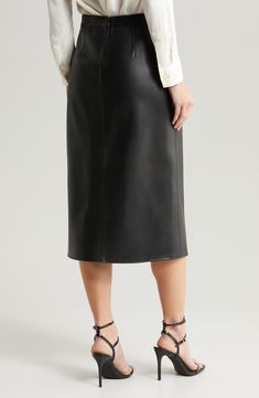 Embossed metallic buttons and flap pockets highlight a smooth faux-leather pencil skirt cut in a versatile midi-length silhouette. 30 1/2" length (size 8) Unlined Hidden back-zip closure Front snap-flap pockets 100% polyester with polyurethane coating Spot clean Imported Faux Leather Midi Skirt, Faux Leather Pencil Skirt, Leather Midi Skirt, Leather Pencil Skirt, Black Midi Skirt, Flap Pocket, Midi Length, Leather Skirt, Size 16