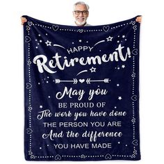 a man holding up a happy retirement blanket with the words, may you be proud of the work you have done and the distance you have made