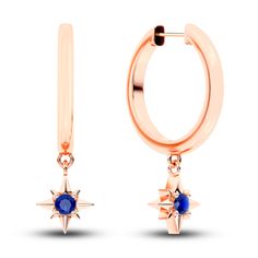 These charmed hoops feature an unexpected pop of color from a dangling solitaire natural blue sapphire gemstone, framed within a star motif setting. These hoops add the perfect amount of chic to every ear. Fashioned in 10K rose gold, the earrings secure in place with hinged backs. From the Juliette Maison collection. Star Motif, Blue Sapphire Gemstone, Jared The Galleria Of Jewelry, Natural Blue Sapphire, Sapphire Gemstone, Mirror Table, Fashion Earrings, Blue Sapphire, Color Pop