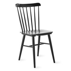 a wooden chair with black wood seat and back, viewed from the front angle on an isolated white background