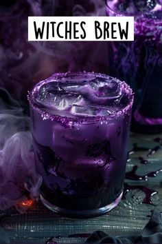 a purple drink sitting on top of a table