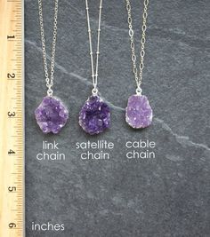 Amethyst Druzy pendant on a custom length Sterling Silver chain. These are smaller more petite sized Druzy pendants, larger ones available here http://etsy.me/2hIe7JRCustomize your necklace to your preferred chain length. Select from 3 chain designs: cable, link or satellite. Brazilian Amethyst is known for having the richest color and incredible sparkle. Each druzy pendant has a unique crystallization formations. These are chunky Amethyst pendants that have a silverplated edging around the pend Lavender Stone Jewelry Gift, Purple Amethyst Necklace With Raw Stone, Purple Amethyst Pendant Crystal Necklace, Purple Necklace With Large Stone For Gift, Spiritual Purple Necklace With Large Stone, Purple Amethyst Gemstones For Jewelry Making, Amethyst Crystal Gift, Purple Mineral Crystal For Jewelry Making, Purple Raw Stone Crystal Pendant Necklace