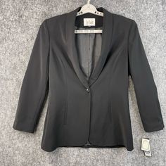 Le Suit Womens Winnipeg Jacket Size 12 One Button *Brand New With Tag. *100% Polyester Lining: 100% Polyester *Comes From A Pet And Smoke-Free Environment *Please See All Pictures For More Details, Measurements, And The Presence Of Flaws. *Feel Free To Ask Questions Before Purchasing Loc: 168-5 Fitted Business Blazer With Snap Buttons, Fitted Blazer With Snap Buttons For Business, Formal Outerwear With Notch Lapel And Snap Buttons, Formal Outerwear With Snap Buttons And Notch Lapel, Formal Fitted Blazer With Snap Buttons, Elegant Notch Lapel Blazer With Snap Buttons, Elegant Blazer With Snap Buttons And Notch Lapel, Formal Blazer With Snap Buttons And Lapel Collar, Elegant Solid Blazer With Snap Buttons