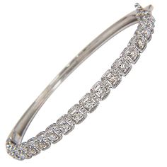 .90ct natural diamonds bangle bracelet Squared rope twist form surrounding each diamond Rounds & Full cut. H-color & Si-1 clarity. 14kt. white gold 11 Grams. 4.6mm wide 6.5 inch (wearable length) Secure Lock, safety catch and snap Diamond Bangle With Pave Setting For Anniversary, Diamond Bangle Bracelet With Diamond Cut, Diamond Bangle Bracelet With 17 Jewels, Platinum Bangle Diamond Bracelet, Diamond Cut Bangle Bracelet, Diamond Bangle Bracelets With Accents, 17 Jewels Bangle Diamond Bracelet For Anniversary, Dazzling Bangle Bracelet With Pavé Setting, Fine Jewelry Diamond Bangle Bracelet With Accents