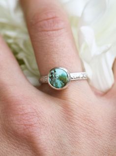 ⮚⮚ About The Design ⮘⮘ This sterling memorial ring design is a sweet celebration of contrasts! A bold 8mm Tibetan turquoise cab meets a petite 3mm comfort band featuring a vintage floral motif. This playful contrast creates the perfect setup for stacking your favorite bands. The example ring shown is in our signature brushed satin finish but can be polished to a high shine or even given an antique patina application for no additional cost. Your beloved's ashes are held within our specially handcrafted urn setting. After the ashes are placed and your choice of turquoise cab is set, your memorial is lovingly gift-wrapped for its journey back to you.  ⮚⮚ Sending Ashes for Your Cremation Jewelry ⮘⮘ Shortly after you complete your purchase, you will receive a .PDF guide with detailed instructio Turquoise Round Band Ring For Anniversary, Stackable Sterling Silver Turquoise Ring For Wedding, Sterling Silver Stackable Turquoise Ring For Wedding, Wedding Stackable Turquoise Ring In Sterling Silver, Stackable Turquoise Ring For Anniversary, Sterling Silver Turquoise Ring With Bezel Setting As Gift, Sterling Silver Turquoise Ring With Bezel Setting For Anniversary, Sterling Silver Bezel Set Turquoise Ring As Gift, Sterling Silver Turquoise Ring With Bezel Setting