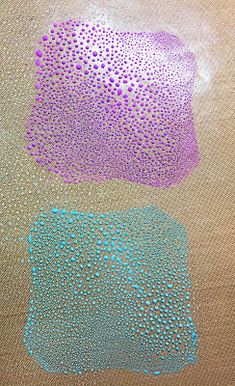 three different shades of blue, purple and green on a beige background with small dots