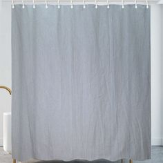 the shower curtain is closed and ready for us to use in the bathroom or on the floor