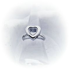 Heart Cremation Ring - Fillable Locket Ring - Heart Urn Ring Cremation Jewelry -Dad Memorial Ring- Child Loss Ring -Mom Memorial Jewelry- Twisted The heart cremation ring has a small screw at the bottom of the heart so you can fill it with your loved one's ashes. The twisted rope band offers comfort as well as fashion. Thos ring is stainless steel and will never tarnish or turn your skin green. The ashes can move around freely or you can fill it completely so they do not move. The ashes can be s Valentine's Day Silver Heart Birthstone Ring, Silver Heart-shaped Birthstone Ring Gift, Hypoallergenic Promise Ring For Mother's Day, Adjustable Heart Cut Rings For Mother's Day, Adjustable Heart Ring For Promise And Mother's Day, Adjustable Heart Ring For Promise On Mother's Day, Adjustable Heart-shaped Crystal Ring Gift, Nickel-free Heart Ring For Valentine's Day, Adjustable Silver Heart-shaped Crystal Ring