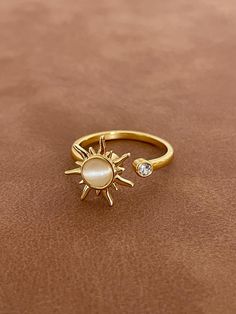 Rotating ring with anti-stress effect thanks to its rotating sun Its size is adjustable In golden stainless steel Rotating Ring, Steel Gifts, Nail Biting, Fidget Rings, Golden Ring, Stylish Accessories, Gift For Women, Rings Statement, Women Rings