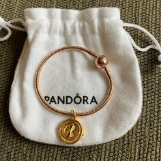 Brand New Without Tag Nwot Authentic Pandora 14k Rose Gold-Plated Moments Snake Chain Bracelet With Harry Potter Time Turner Charm Bracelet Is $225 From Pandora Website Very Pretty Bracelet. One Of My Favorite Bracelet From Pandora. Bracelet Length Total Is 6” Come With Pandora Pouch. Also Come With Harry Potter Time Turner Charm. (High Quality Charm But Not Pandora) Please Review All Photos And Video. Pink Gold Bracelet Gift, Rose Gold Charm Bracelet For Gift, Rose Gold Charm Bracelet As A Gift, Tarnish Resistant Rose Gold Round Bracelet, Rose Gold Charms Bracelet For Anniversary, Rose Gold Jubilee Charm Bracelet For Anniversary, Rose Gold Round Bracelet Tarnish Resistant, Tarnish Resistant Rose Gold Bracelet, Rose Gold Charm Bracelet With Jubilee Bracelet