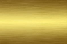 a gold metal texture background that looks like it has been brushed