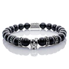 Onyx Beads Black Matt Silver Skull 4 Crown Women's/ men's bracelet Handmade onyx beaded bracelet with a platinum plated skull. Rounded off by four intermediate elements and a beautiful engraved cylinder. All elements are made of stainless steel. The striking design and high-quality workmanship as well as our branded stainless steel cylinder back piece with our logo make the bracelet an unmistakable piece of jewelry. * Premium onyx beads Ø 8 mm * High quality * Branded back piece *Made in Germany Black Skull Stainless Steel Jewelry, Black Stainless Steel Skull Jewelry, Black Stainless Steel Jewelry With Round Beads, Silver Onyx Beaded Bracelets With 8mm Beads, Silver Skull Beaded Bracelets As Gift, Silver Onyx Bracelets With 8mm Beads, Adjustable Black Stainless Steel Charm Bracelet, Skull Shaped 8mm Bead Jewelry Gift, Adjustable Silver Skull Beaded Bracelets