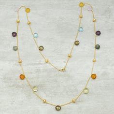 Introducing the Marco Bicego necklace, a stunning piece that effortlessly combines elegance and vibrancy. This exquisite necklace features a gold chain adorned with a captivating array of multi-colored gemstones. Each gemstone is carefully selected to create a harmonious blend of colors, adding a touch of sophistication to any outfit. With its impeccable craftsmanship and attention to detail, this necklace is a true testament to Marco Bicego's renowned artistry. Elevate your style and make a sta Multicolor Gold-plated Necklaces For Parties, Multicolor Gold Plated Necklaces For Party, Multicolor Briolette Stone Necklace, Gold Necklaces With Gemstone Accents For Party, Multicolor Gemstone Necklace For Party, Multicolor Natural Stones Necklace For Party, Gold Briolette Necklaces For Parties, Multicolor Briolette Necklace With Gemstone Accents, Yellow Gold-plated Multi-stone Necklace