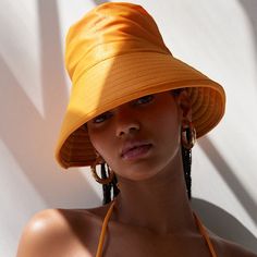 New With Tag. Oversized Bucket Hat With An Allover Metallic Shimmer. Ribbed Wide Brim Perfect For Keeping You Cool On Sunny Days. - 85% Polyester, 15% Spandex - Spot Clean Urban Outfitters Casual Short Brim Hat, Orange Wide Brim Sun Hat For Spring, Urban Outfitters Hats With Adjustable Fit And Short Brim, Urban Outfitters Adjustable Hat With Short Brim, Urban Outfitters Adjustable Short Brim Hat, Spring Hats From Urban Outfitters, Urban Outfitters Casual Hat With Curved Brim, Urban Outfitters Casual Curved Brim Hat, Orange Wide Brim Sun Hat