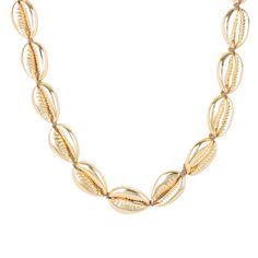 This natured inspired necklace with Cowrie shell inspired detailing is elegant and chic, whilst giving a nod to its bohemian roots. The high polished finish radiates with a metallic shine. The versatility of this necklace means it looks great with a paired down casual look, or as a choker with a little black dress. A definite holiday essential. 22ct gold plated.  Ideal for those who love statement jewellery. A holiday and vacation essential. Pair with our matching coral earrings. Coachella festi Elegant Strand Necklace, Elegant Silver Jewelry For Vacation, Elegant Shell Necklace For Vacation, Yellow Gold Necklaces For Beach, Elegant Silver Shell Necklace For Beach, Elegant Silver Shell Beach Necklace, Elegant Gold Strand Jewelry, Elegant Shell-shaped Necklace For The Beach, Gold Long Necklace For Beach