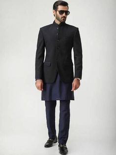 <p>Color: Black<br />Fabric: Jamawar<br />Elegant plain prince coat<br />Fancy button closure<br />Comes with oxford blue kurta and pajama<br /><br /><strong>Additional Accessories:</strong> <br /><strong>Plain Kolhapuri/Saleem Shahi shoes:</strong> US$30 (Made with prince coat material)</p> <p><strong>Note:</strong> Price of all prince coat suits includes only 3 pieces i.e. prince coat, kurta/kameez and shalwar/pajama (or whatever bottom is mentioned in product description). Extra charges will Festive Bandhgala With Stand Collar, Tailored Long Sleeve Bandhgala For Eid, Tailored Bandhgala For Business Or Festive Occasions, Festive Long Sleeve Bandhgala For Business, Formal Stand Collar Outerwear For Eid, Formal Stand Collar Kurta For Eid, Festive Tailored Nehru Jacket For Business, Festive Nehru Jacket For Business, Classic Nehru Jacket For Eid And Formal Occasions