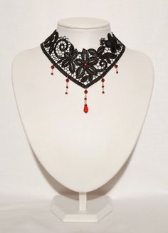 Gothic lace choker necklace with a Ruby red Swarovski crystal | Etsy Adjustable Gothic Style Necklaces For Wedding, Vampire Style Black Jewelry For Festivals, Adjustable Gothic Jewelry For Party, Elegant Adjustable Halloween Jewelry, Elegant Handmade Costume Jewelry, Elegant Red Choker For Formal Occasions, Handmade Gothic Jewelry For Party, Handmade Gothic Jewelry For Evening, Black Vampire Jewelry For Festival