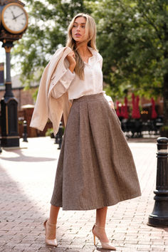 Experience effortless elegance with our Left Unsaid Brown Herringbone Tweed Midi Skirt. Constructed with a soft, herringbone fabric, this midi skirt is perfect for any occasion. The subtle pattern adds a touch of sophistication, while the relaxed fit ensures comfort all day long. Elevate your wardrobe with this versatile and stylish piece! This brown skirt features a midi length, functional hip pockets, a herringbone print, and a discrete back zipper. Herringbone Skirt, Tweed Midi Skirt, Preppy Girls, New England Fall, Herringbone Fabric, Rush Dresses, Brown Skirt, Herringbone Tweed, Brown Skirts