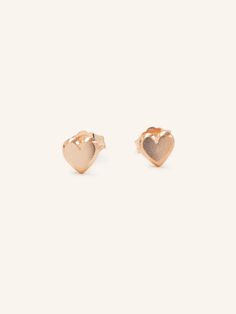 With an understated air of elegance and sophistication, these classic beveled heart earrings are the perfect addition to any jewelry collection. Pair them with your favorite statement necklace or wear them separately for an understated glam look. Elegant Heart Cut Earrings For Gift, Minimalist Heart Cut Jewelry With Polished Finish, Minimalist Heart Cut Polished Jewelry, Elegant Rose Gold Heart Cut Earrings, Formal Heart-shaped Earrings For Pierced Ears, Sterling Silver Heart Earrings Tarnish Resistant For Everyday, Elegant Heart-shaped Tarnish Resistant Earrings, Elegant Pierced Heart Earrings, Elegant Heart-shaped Tarnish-resistant Earrings