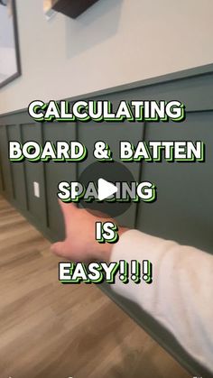 someone is holding their hand up to the wall in front of them that says, calculating board & batten spaing is easy