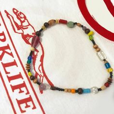 Blur Damon Albarn Inspired Glass Bead Necklace Retro Wooden Beads Jewelry, Retro Wooden Bead Jewelry, Retro Handmade Necklaces For Festival, Retro Wooden Round Bead Jewelry, Handmade Retro Necklaces For Festival, Retro Handmade Necklace For Festival, Handmade Retro Necklace For Festival, Handmade Retro Necklace For Festivals, Retro Brown Handmade Necklaces